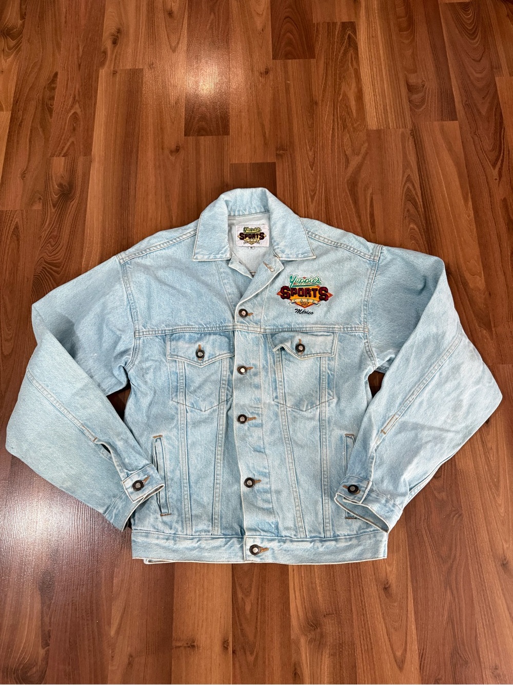 vintage Light Blue Denim Jacket with Embroidered Sports Patch